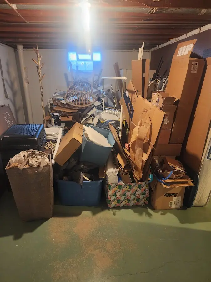 Roll-off dumpster container at job site for 2 Yard Dumpster Rental in Leawood